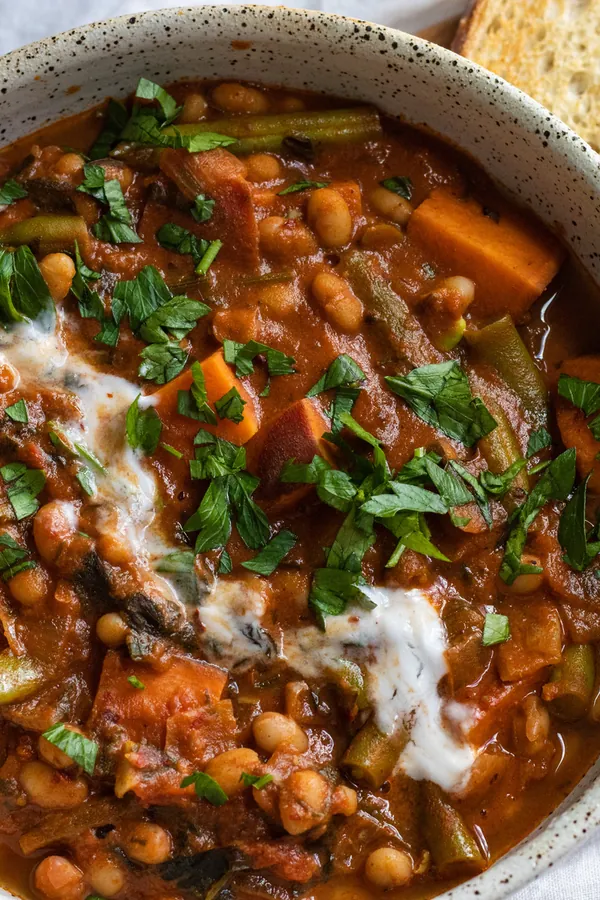 sweet potato and white bean stew with harissa and tahini (vegan)