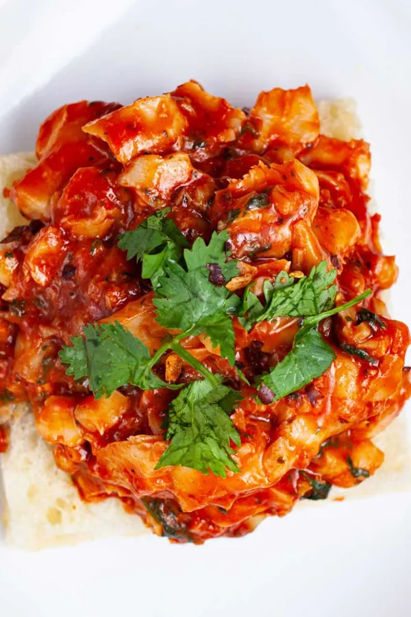 Cod Focaccia Sandwich With A Red Tomato Sauce