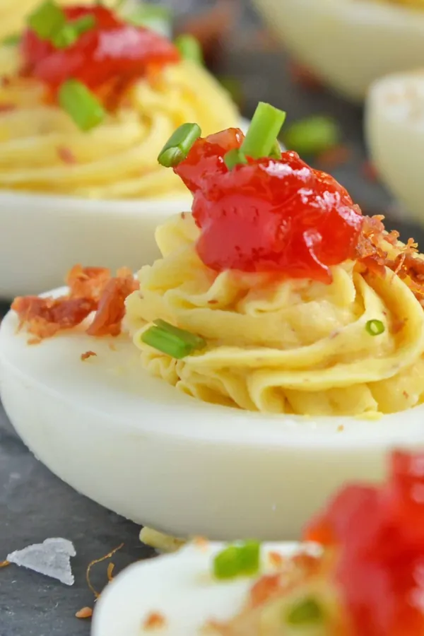 Horseradish Deviled Eggs with Tomato Jam
